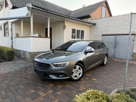 Серый Опель Инсигния, объемом двигателя 1.6 л и пробегом 255 тыс. км за 12950 $, фото 1 на Automoto.ua