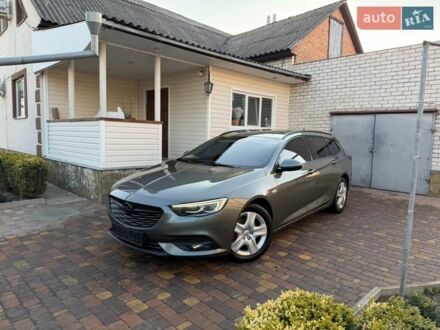 Серый Опель Инсигния, объемом двигателя 1.6 л и пробегом 255 тыс. км за 12950 $, фото 1 на Automoto.ua