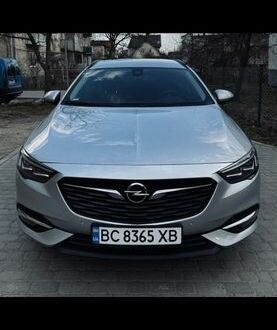 Серый Опель Инсигния, объемом двигателя 2 л и пробегом 238 тыс. км за 15500 $, фото 1 на Automoto.ua