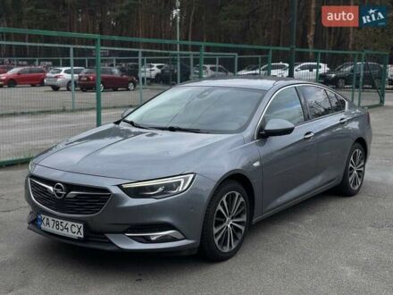 Серый Опель Инсигния, объемом двигателя 2 л и пробегом 220 тыс. км за 17000 $, фото 1 на Automoto.ua
