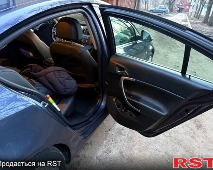 Синий Опель Инсигния, объемом двигателя 2 л и пробегом 350 тыс. км за 4000 $, фото 9 на Automoto.ua