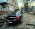 Синий Опель Инсигния, объемом двигателя 2 л и пробегом 350 тыс. км за 4000 $, фото 4 на Automoto.ua