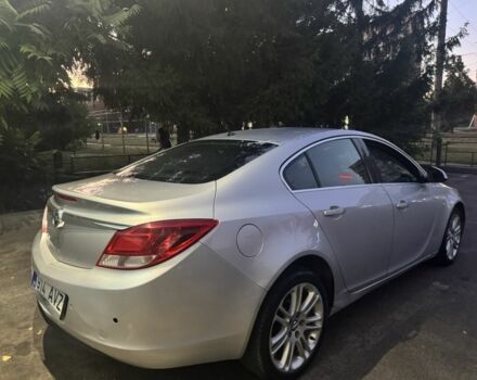 Синий Опель Инсигния, объемом двигателя 1.8 л и пробегом 314 тыс. км за 3500 $, фото 11 на Automoto.ua