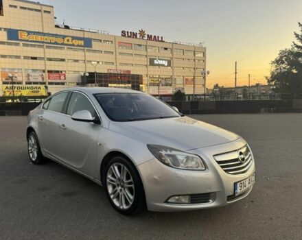 Синий Опель Инсигния, объемом двигателя 1.8 л и пробегом 314 тыс. км за 3500 $, фото 2 на Automoto.ua