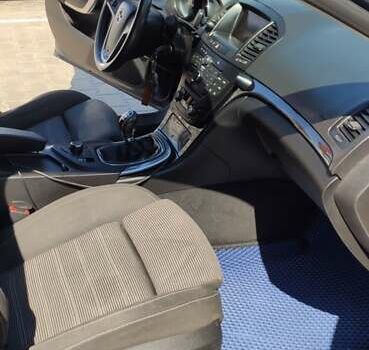 Синий Опель Инсигния, объемом двигателя 1.96 л и пробегом 190 тыс. км за 7500 $, фото 11 на Automoto.ua