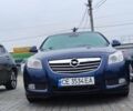Синий Опель Инсигния, объемом двигателя 2 л и пробегом 240 тыс. км за 9500 $, фото 1 на Automoto.ua