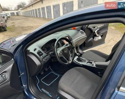 Синий Опель Инсигния, объемом двигателя 1.36 л и пробегом 144 тыс. км за 11250 $, фото 2 на Automoto.ua