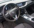 Синий Опель Инсигния, объемом двигателя 2 л и пробегом 160 тыс. км за 11507 $, фото 4 на Automoto.ua