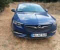 Синий Опель Инсигния, объемом двигателя 2 л и пробегом 160 тыс. км за 11507 $, фото 1 на Automoto.ua