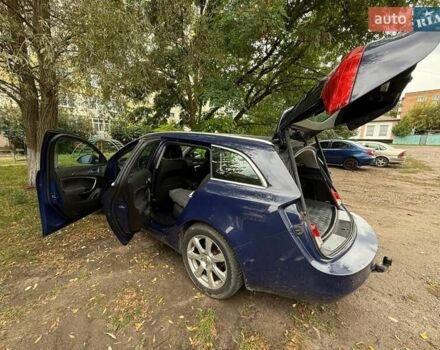 Синій Опель Інсігнія, об'ємом двигуна 2 л та пробігом 241 тис. км за 7100 $, фото 5 на Automoto.ua