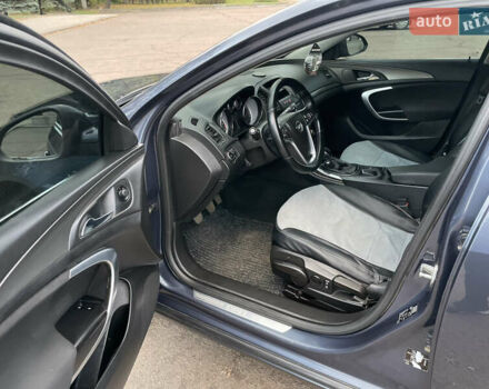 Синий Опель Инсигния, объемом двигателя 1.96 л и пробегом 289 тыс. км за 6594 $, фото 4 на Automoto.ua