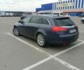 Синий Опель Инсигния, объемом двигателя 1.96 л и пробегом 240 тыс. км за 6500 $, фото 1 на Automoto.ua