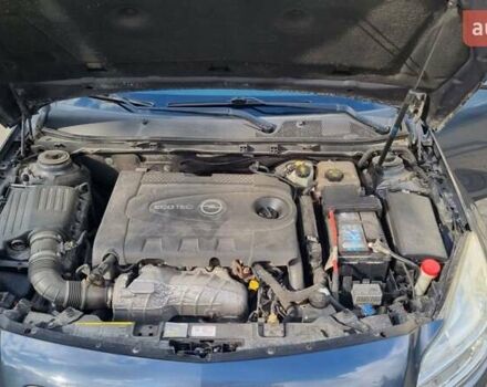 Синий Опель Инсигния, объемом двигателя 1.96 л и пробегом 319 тыс. км за 5600 $, фото 3 на Automoto.ua