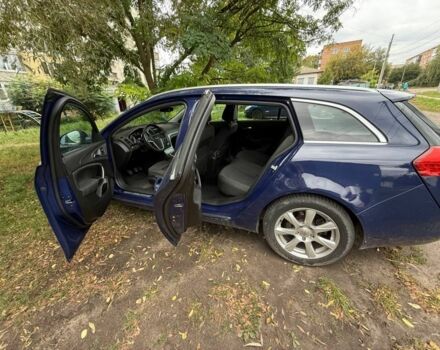 Синій Опель Інсігнія, об'ємом двигуна 2 л та пробігом 241 тис. км за 7100 $, фото 3 на Automoto.ua