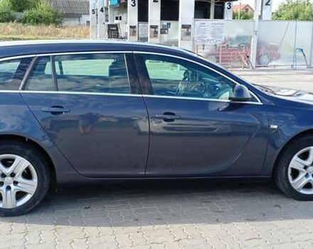 Синий Опель Инсигния, объемом двигателя 2 л и пробегом 252 тыс. км за 6299 $, фото 5 на Automoto.ua