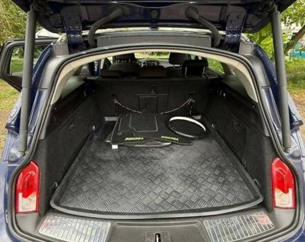 Синій Опель Інсігнія, об'ємом двигуна 2 л та пробігом 241 тис. км за 7100 $, фото 4 на Automoto.ua