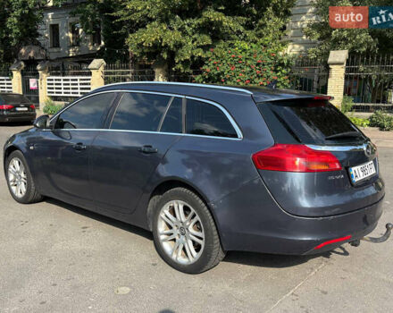 Синий Опель Инсигния, объемом двигателя 1.96 л и пробегом 312 тыс. км за 7500 $, фото 6 на Automoto.ua