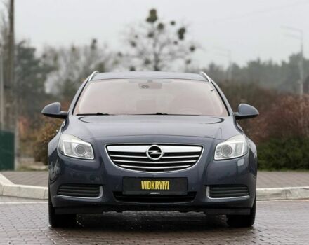 Синий Опель Инсигния, объемом двигателя 2 л и пробегом 306 тыс. км за 6800 $, фото 1 на Automoto.ua