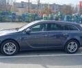 Синий Опель Инсигния, объемом двигателя 1.96 л и пробегом 240 тыс. км за 6000 $, фото 2 на Automoto.ua
