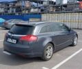 Синий Опель Инсигния, объемом двигателя 1.96 л и пробегом 240 тыс. км за 6000 $, фото 4 на Automoto.ua