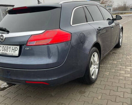 Синий Опель Инсигния, объемом двигателя 1.96 л и пробегом 246 тыс. км за 6650 $, фото 4 на Automoto.ua