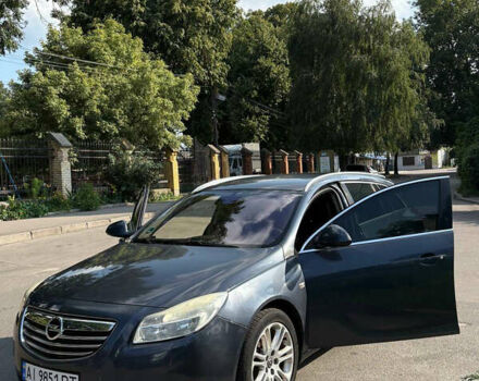 Синий Опель Инсигния, объемом двигателя 1.96 л и пробегом 312 тыс. км за 7500 $, фото 1 на Automoto.ua