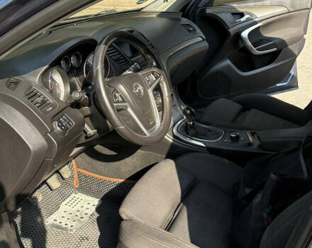 Синий Опель Инсигния, объемом двигателя 1.96 л и пробегом 312 тыс. км за 7500 $, фото 2 на Automoto.ua