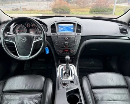 Синий Опель Инсигния, объемом двигателя 2 л и пробегом 306 тыс. км за 6800 $, фото 2 на Automoto.ua
