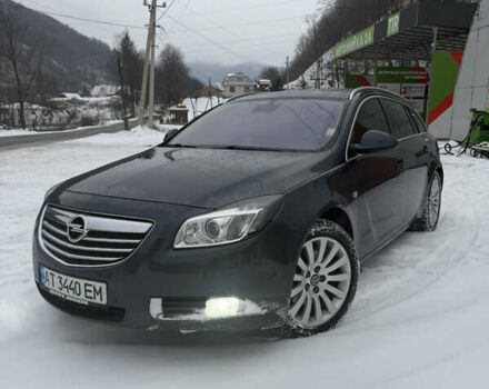 Синий Опель Инсигния, объемом двигателя 2 л и пробегом 256 тыс. км за 7800 $, фото 1 на Automoto.ua