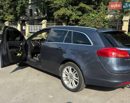 Синий Опель Инсигния, объемом двигателя 1.96 л и пробегом 312 тыс. км за 7500 $, фото 4 на Automoto.ua