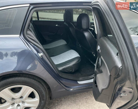 Синий Опель Инсигния, объемом двигателя 1.96 л и пробегом 289 тыс. км за 6594 $, фото 11 на Automoto.ua