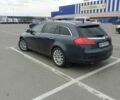 Синій Опель Інсігнія, об'ємом двигуна 2 л та пробігом 245 тис. км за 6196 $, фото 2 на Automoto.ua