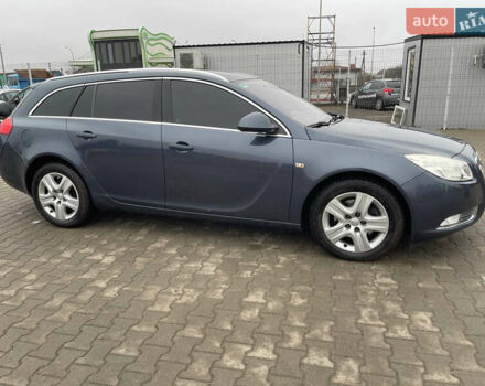 Синий Опель Инсигния, объемом двигателя 1.96 л и пробегом 246 тыс. км за 6650 $, фото 5 на Automoto.ua