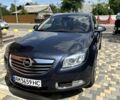 Синий Опель Инсигния, объемом двигателя 2 л и пробегом 265 тыс. км за 7000 $, фото 5 на Automoto.ua