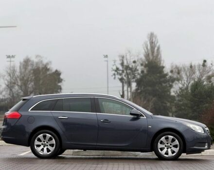 Синий Опель Инсигния, объемом двигателя 2 л и пробегом 306 тыс. км за 6800 $, фото 5 на Automoto.ua