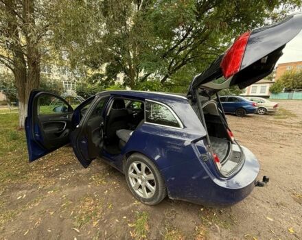 Синій Опель Інсігнія, об'ємом двигуна 2 л та пробігом 241 тис. км за 7100 $, фото 6 на Automoto.ua