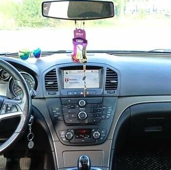 Синий Опель Инсигния, объемом двигателя 2 л и пробегом 252 тыс. км за 6299 $, фото 2 на Automoto.ua