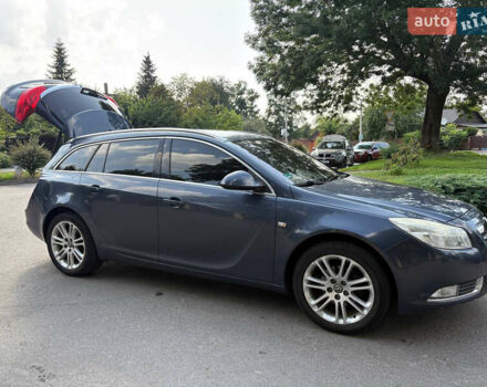 Синий Опель Инсигния, объемом двигателя 1.96 л и пробегом 312 тыс. км за 7500 $, фото 7 на Automoto.ua