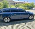 Синий Опель Инсигния, объемом двигателя 1.8 л и пробегом 180 тыс. км за 9000 $, фото 3 на Automoto.ua