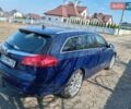 Синий Опель Инсигния, объемом двигателя 2 л и пробегом 329 тыс. км за 6500 $, фото 1 на Automoto.ua