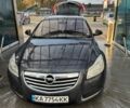 Синий Опель Инсигния, объемом двигателя 2 л и пробегом 312 тыс. км за 4700 $, фото 1 на Automoto.ua