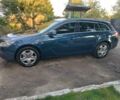 Синий Опель Инсигния, объемом двигателя 2 л и пробегом 290 тыс. км за 6512 $, фото 3 на Automoto.ua