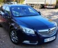 Синий Опель Инсигния, объемом двигателя 2 л и пробегом 325 тыс. км за 6200 $, фото 1 на Automoto.ua