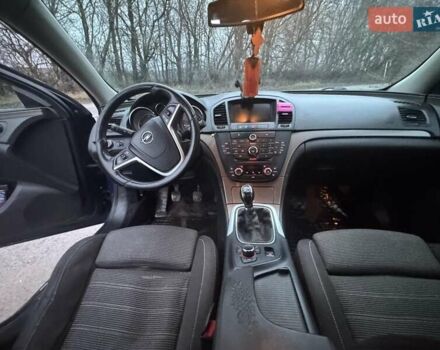 Синий Опель Инсигния, объемом двигателя 1.96 л и пробегом 298 тыс. км за 7200 $, фото 6 на Automoto.ua