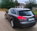 Синий Опель Инсигния, объемом двигателя 1.96 л и пробегом 252 тыс. км за 6500 $, фото 6 на Automoto.ua