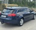 Синий Опель Инсигния, объемом двигателя 2 л и пробегом 351 тыс. км за 6800 $, фото 3 на Automoto.ua