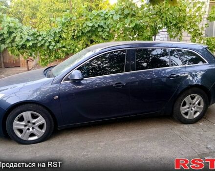 Синий Опель Инсигния, объемом двигателя 2 л и пробегом 230 тыс. км за 5500 $, фото 3 на Automoto.ua