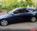 Синий Опель Инсигния, объемом двигателя 2 л и пробегом 230 тыс. км за 5500 $, фото 1 на Automoto.ua