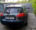 Синий Опель Инсигния, объемом двигателя 2 л и пробегом 230 тыс. км за 5500 $, фото 1 на Automoto.ua