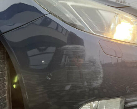 Синий Опель Инсигния, объемом двигателя 1.96 л и пробегом 246 тыс. км за 7200 $, фото 4 на Automoto.ua